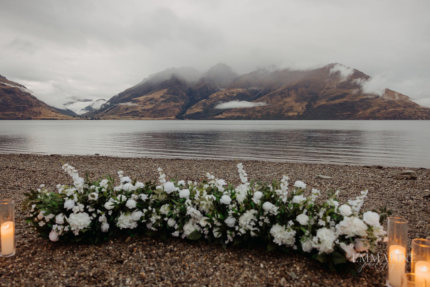 Luxury floral setup on the lakeside of Lake Wakatipu with mountains as a backdrop. 